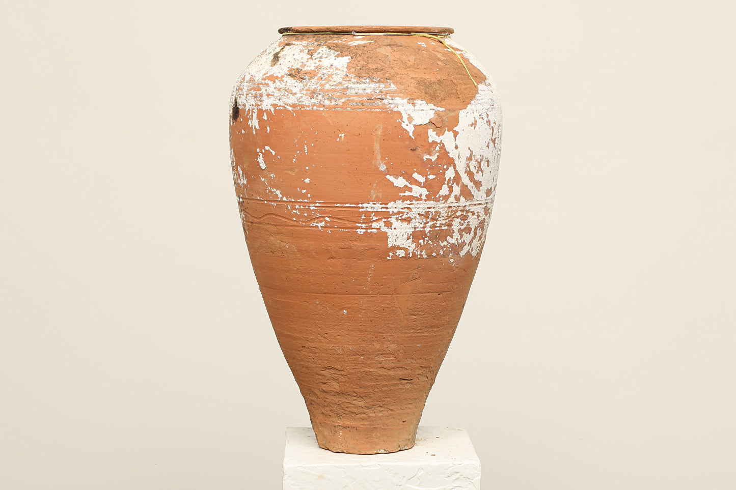 A one-of-a-kind clay brown white Turkish vintage vase pot without handle, crafted from terra cotta clay, this piece showcases timeless quality and antique craftsmanship, adding a unique touch of history to your space