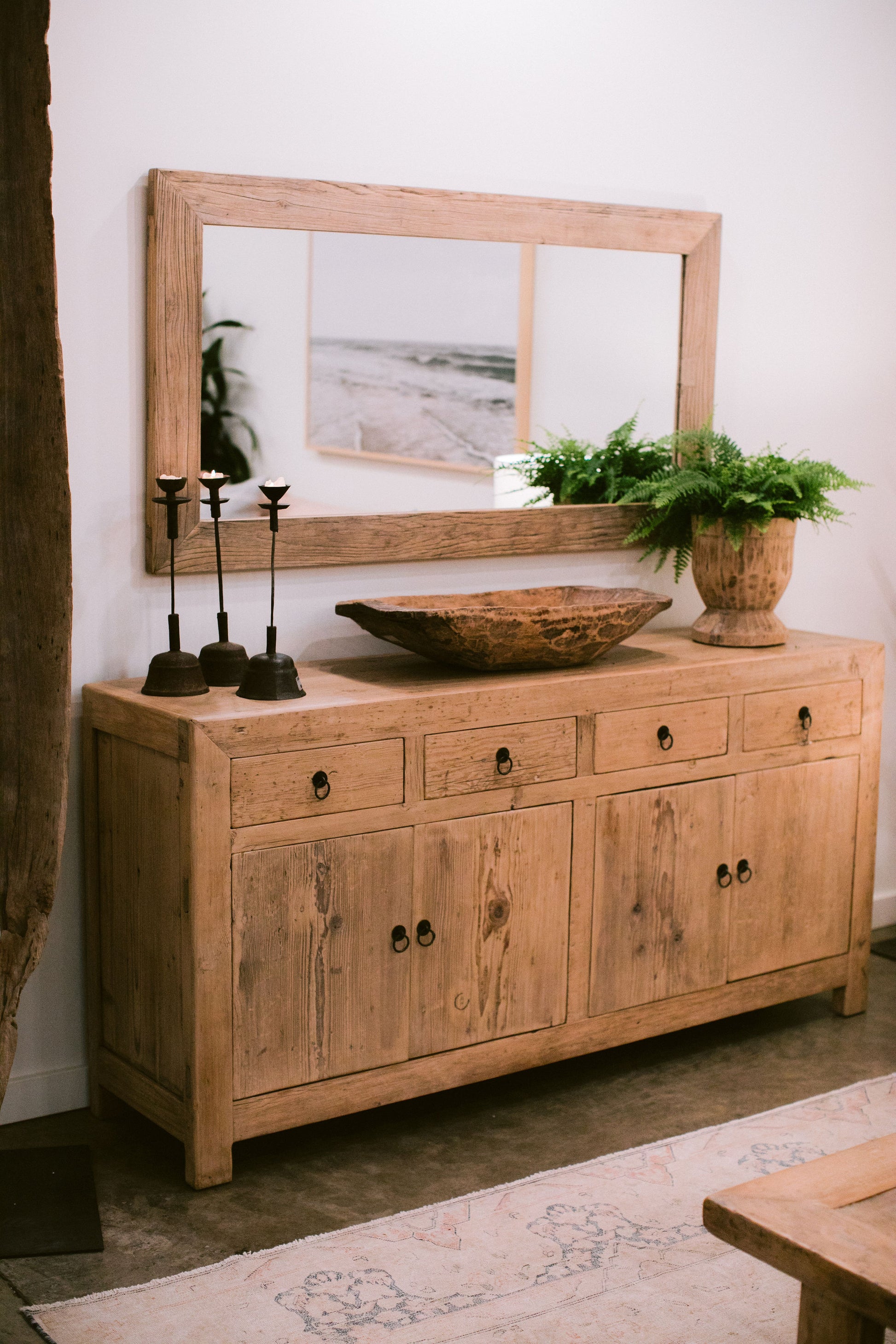 Hand-crafted modern rustic reclaimed solid elm light natural wood Claire sideboard is a unique 72-inch long buffet storage cabinet with four drawers and two cabinets.