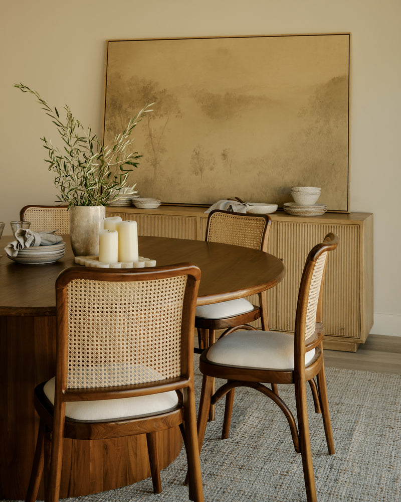 Dining table set with ceramics and serveware