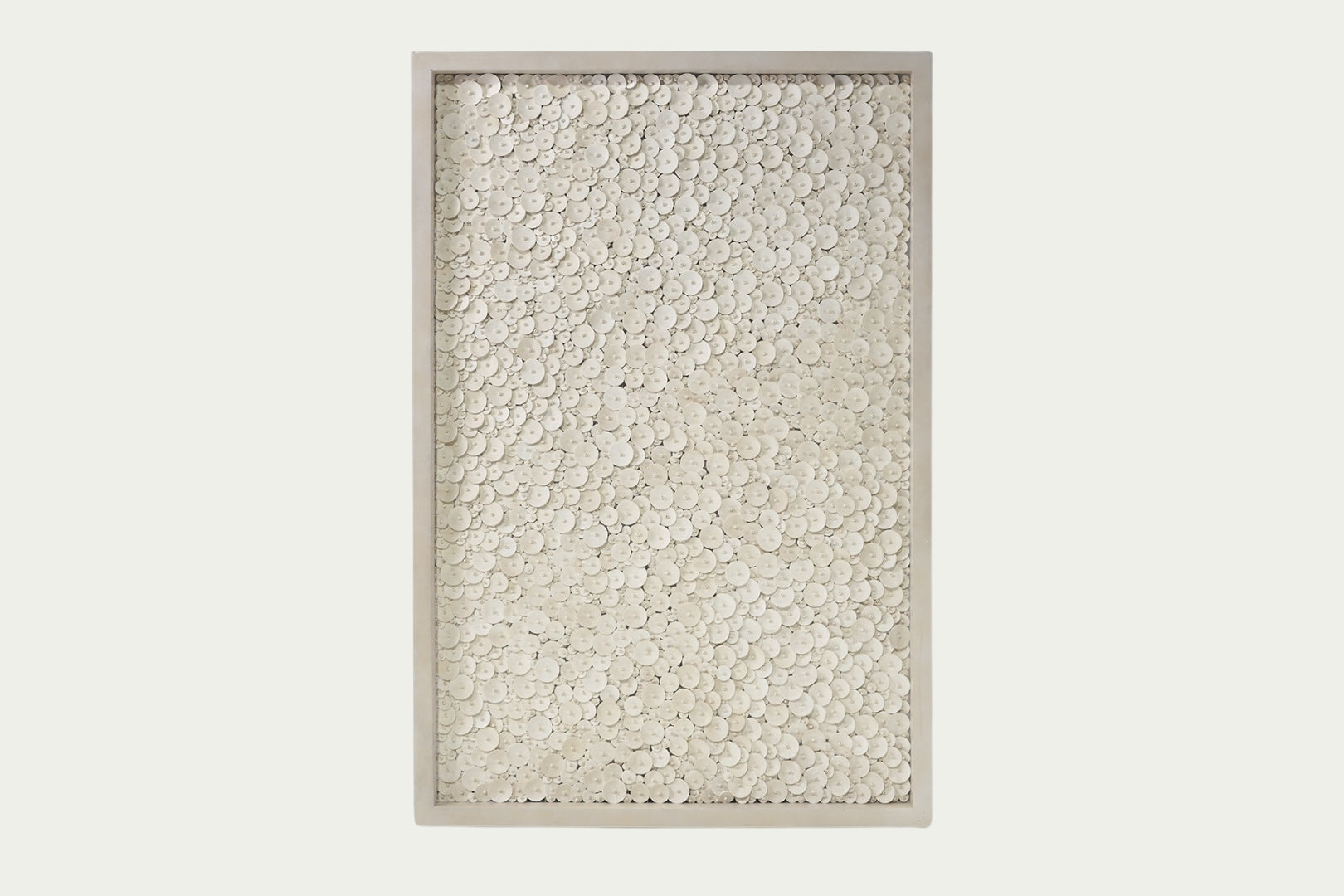 Amalia Coco wall art decor features coconut shell discs and beads- coastal style for the home