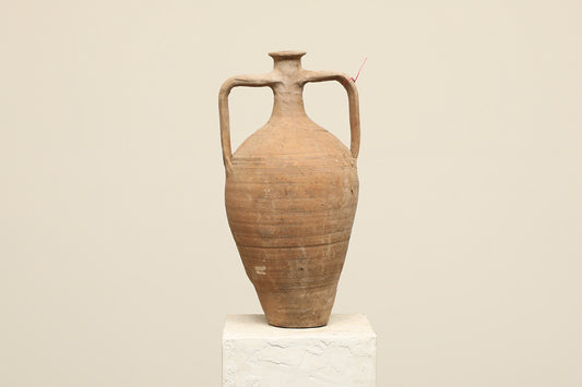 A one-of-a-kind clay brown Turkish vintage vase pot with two handles, crafted from terra cotta clay, this piece showcases timeless quality and antique craftsmanship, adding a unique touch of history to your space