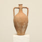 A one-of-a-kind clay brown Turkish vintage vase pot with two handles, crafted from terra cotta clay, this piece showcases timeless quality and antique craftsmanship, adding a unique touch of history to your space