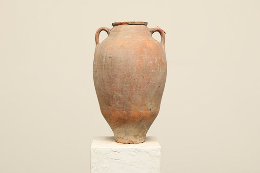 A one-of-a-kind clay brown Turkish vintage vase pot with two handles, crafted from terra cotta clay, this piece showcases timeless quality and antique craftsmanship, adding a unique touch of history to your space