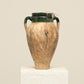 A one-of-a-kind brown Turkish vintage vase pot with two handles, crafted from terra cotta clay, this piece showcases timeless quality and antique craftsmanship, adding a unique touch of history to your space