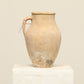 A one-of-a-kind clay brown Turkish vintage vase pot with a handle, crafted from terra cotta clay, this piece showcases timeless quality and antique craftsmanship, adding a unique touch of history to your space