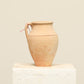 A one-of-a-kind clay brown Turkish vintage vase pot with a handle, crafted from terra cotta clay, this piece showcases timeless quality and antique craftsmanship, adding a unique touch of history to your space
