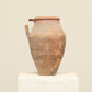 A one-of-a-kind clay brown Turkish vintage vase pot with a handle, crafted from terra cotta clay, this piece showcases timeless quality and antique craftsmanship, adding a unique touch of history to your space