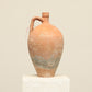 A one-of-a-kind clay brown Turkish vintage vase pot with a handle, crafted from terra cotta clay, this piece showcases timeless quality and antique craftsmanship, adding a unique touch of history to your space