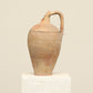 A one-of-a-kind clay brown Turkish vintage vase pot with a handle , crafted from terra cotta clay, this piece showcases timeless quality and antique craftsmanship, adding a unique touch of history to your space