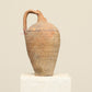 A one-of-a-kind clay brown Turkish vintage vase pot with a handle , crafted from terra cotta clay, this piece showcases timeless quality and antique craftsmanship, adding a unique touch of history to your space