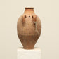 A one-of-a-kind clay brown Turkish vintage vase pot with two handles, crafted from terra cotta clay, this piece showcases timeless quality and antique craftsmanship, adding a unique touch of history to your space