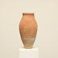 A one-of-a-kind clay brown Turkish vintage vase pot without a handle, crafted from terra cotta clay, this piece showcases timeless quality and antique craftsmanship, adding a unique touch of history to your space