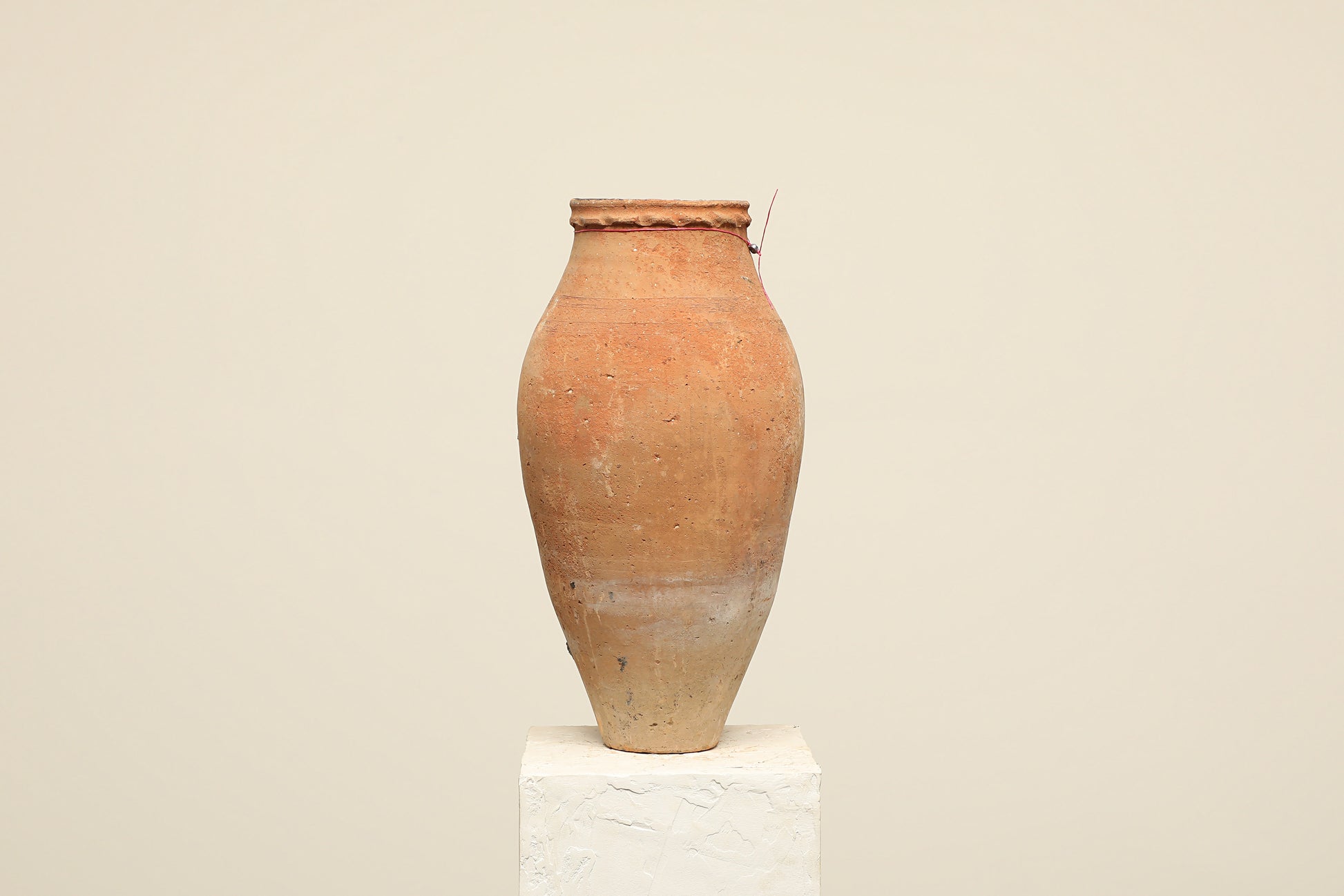 A one-of-a-kind clay brown Turkish vintage vase pot without a handle, crafted from terra cotta clay, this piece showcases timeless quality and antique craftsmanship, adding a unique touch of history to your space