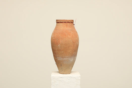 A one-of-a-kind clay brown Turkish vintage vase pot without a handle, crafted from terra cotta clay, this piece showcases timeless quality and antique craftsmanship, adding a unique touch of history to your space