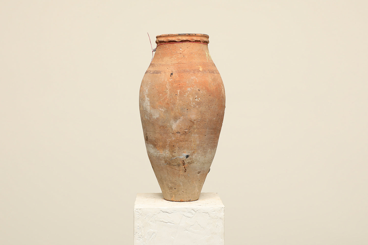 A one-of-a-kind clay brown Turkish vintage vase pot without a handle, crafted from terra cotta clay, this piece showcases timeless quality and antique craftsmanship, adding a unique touch of history to your space