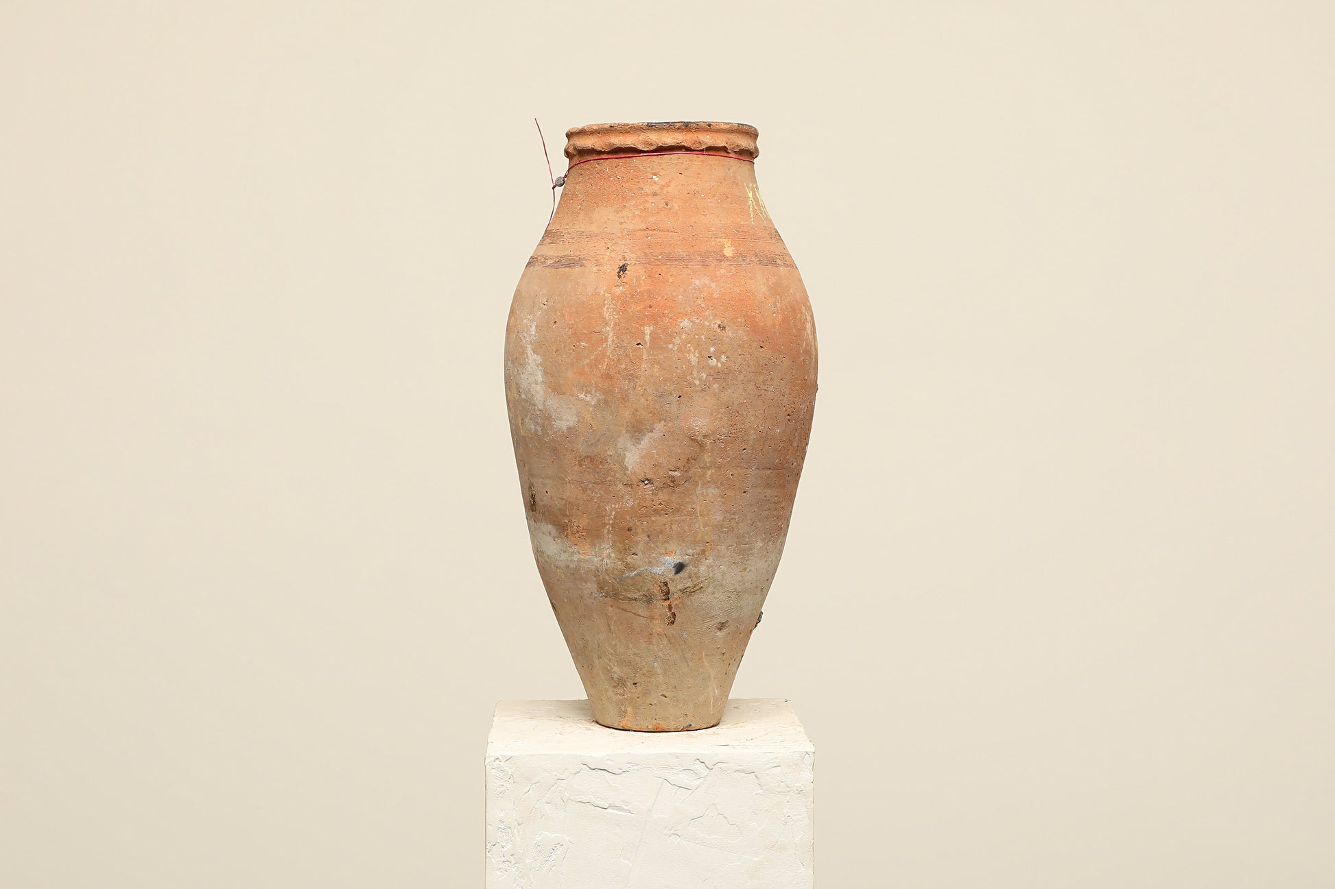 A one-of-a-kind clay brown Turkish vintage vase pot without a handle, crafted from terra cotta clay, this piece showcases timeless quality and antique craftsmanship, adding a unique touch of history to your space