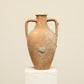 A one-of-a-kind clay brown Turkish vintage vase pot with two handles, crafted from terra cotta clay, this piece showcases timeless quality and antique craftsmanship, adding a unique touch of history to your space