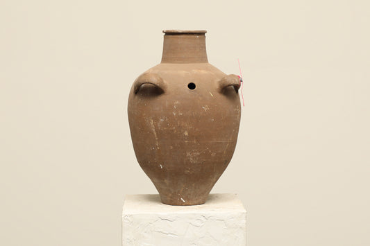 A one-of-a-kind clay brown Turkish vintage vase pot with two handles, crafted from terra cotta clay, this piece showcases timeless quality and antique craftsmanship, adding a unique touch of history to your space