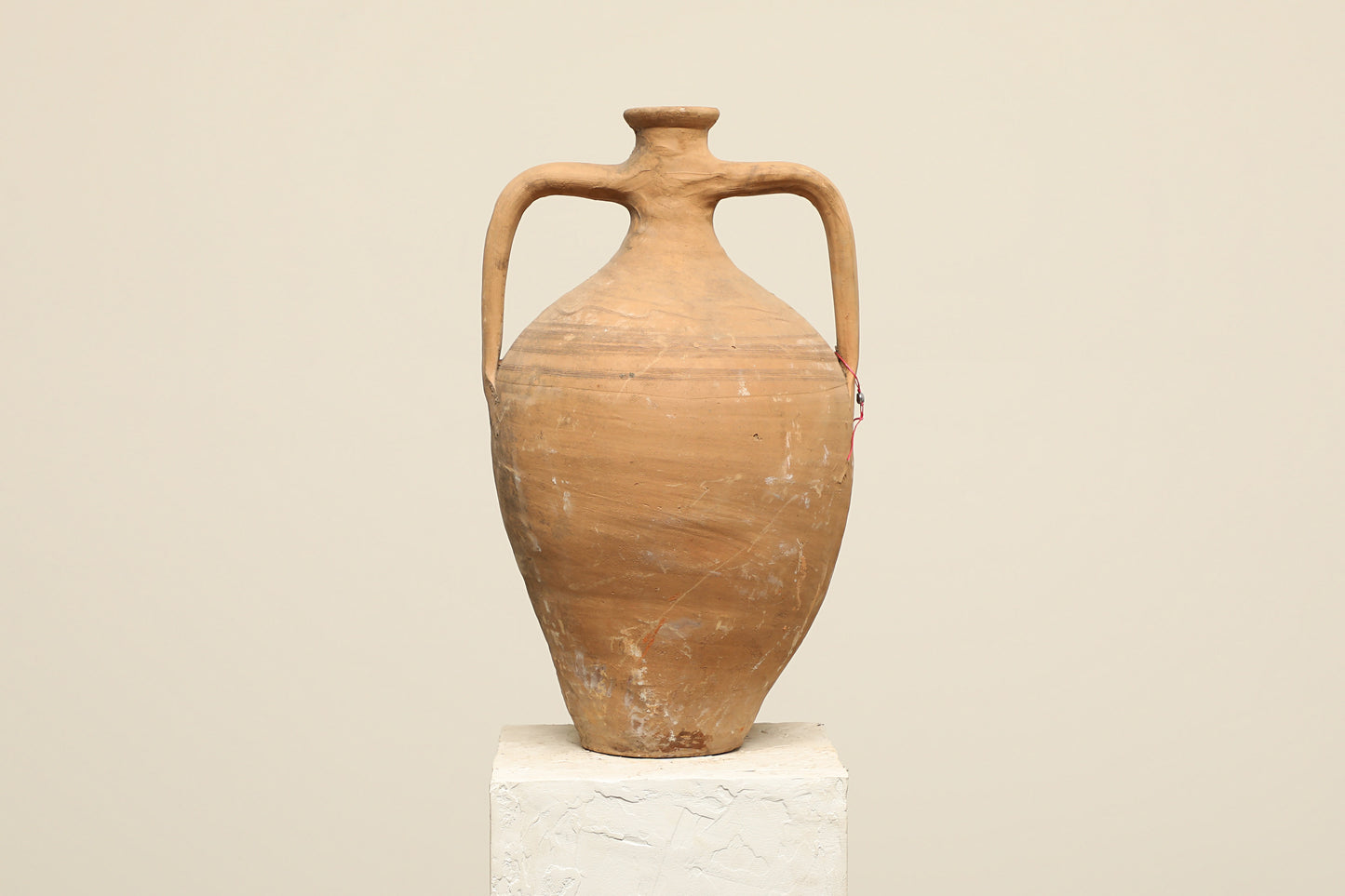 A one-of-a-kind clay brown Turkish vintage vase pot with two handles, crafted from terra cotta clay, this piece showcases timeless quality and antique craftsmanship, adding a unique touch of history to your space