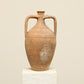 A one-of-a-kind clay brown Turkish vintage vase pot with two handles, crafted from terra cotta clay, this piece showcases timeless quality and antique craftsmanship, adding a unique touch of history to your space