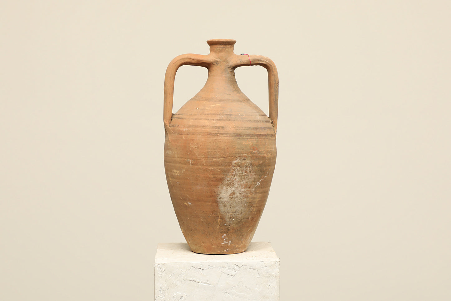 A one-of-a-kind clay brown Turkish vintage vase pot with two handles, crafted from terra cotta clay, this piece showcases timeless quality and antique craftsmanship, adding a unique touch of history to your space