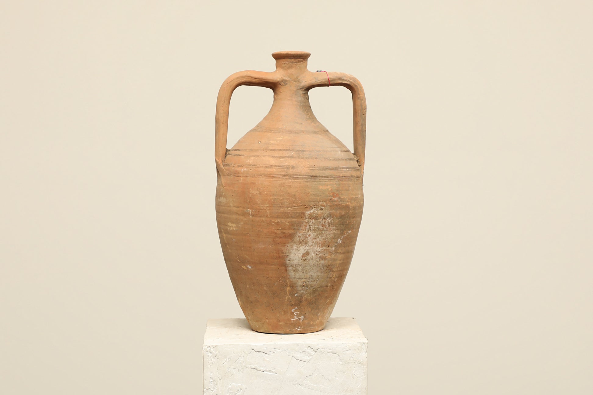 A one-of-a-kind clay brown Turkish vintage vase pot with two handles, crafted from terra cotta clay, this piece showcases timeless quality and antique craftsmanship, adding a unique touch of history to your space