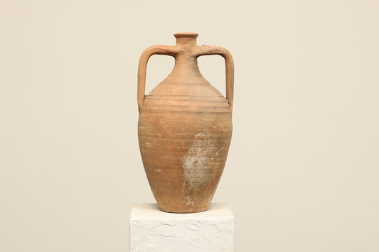 A one-of-a-kind clay brown Turkish vintage vase pot with two handles, crafted from terra cotta clay, this piece showcases timeless quality and antique craftsmanship, adding a unique touch of history to your space