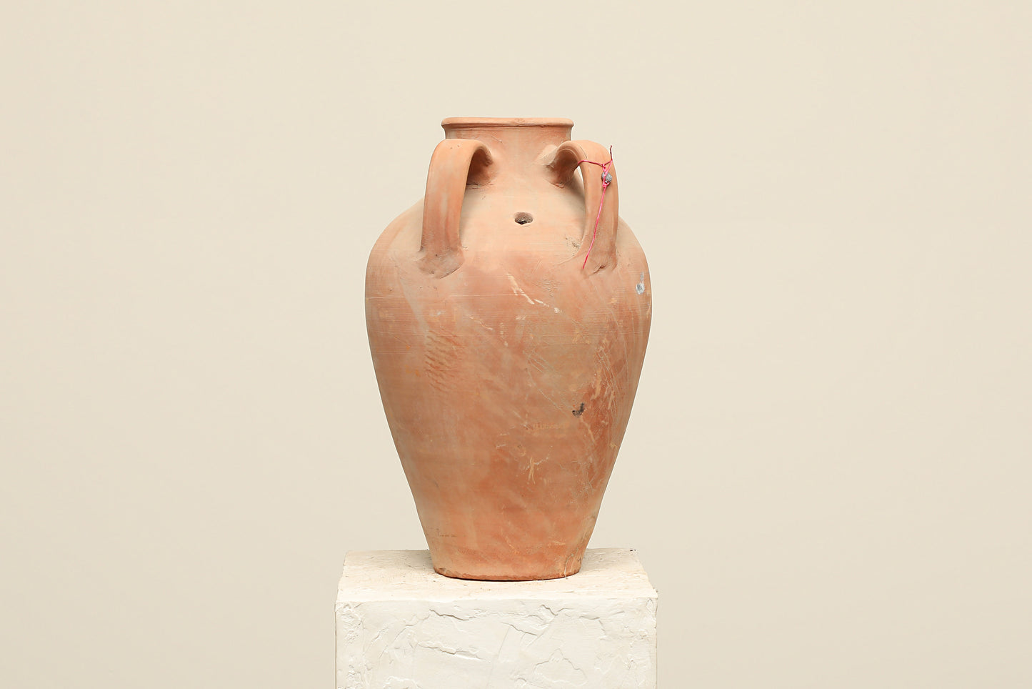 A one-of-a-kind clay brown Turkish vintage vase pot with two handles, crafted from terra cotta clay, this piece showcases timeless quality and antique craftsmanship, adding a unique touch of history to your space
