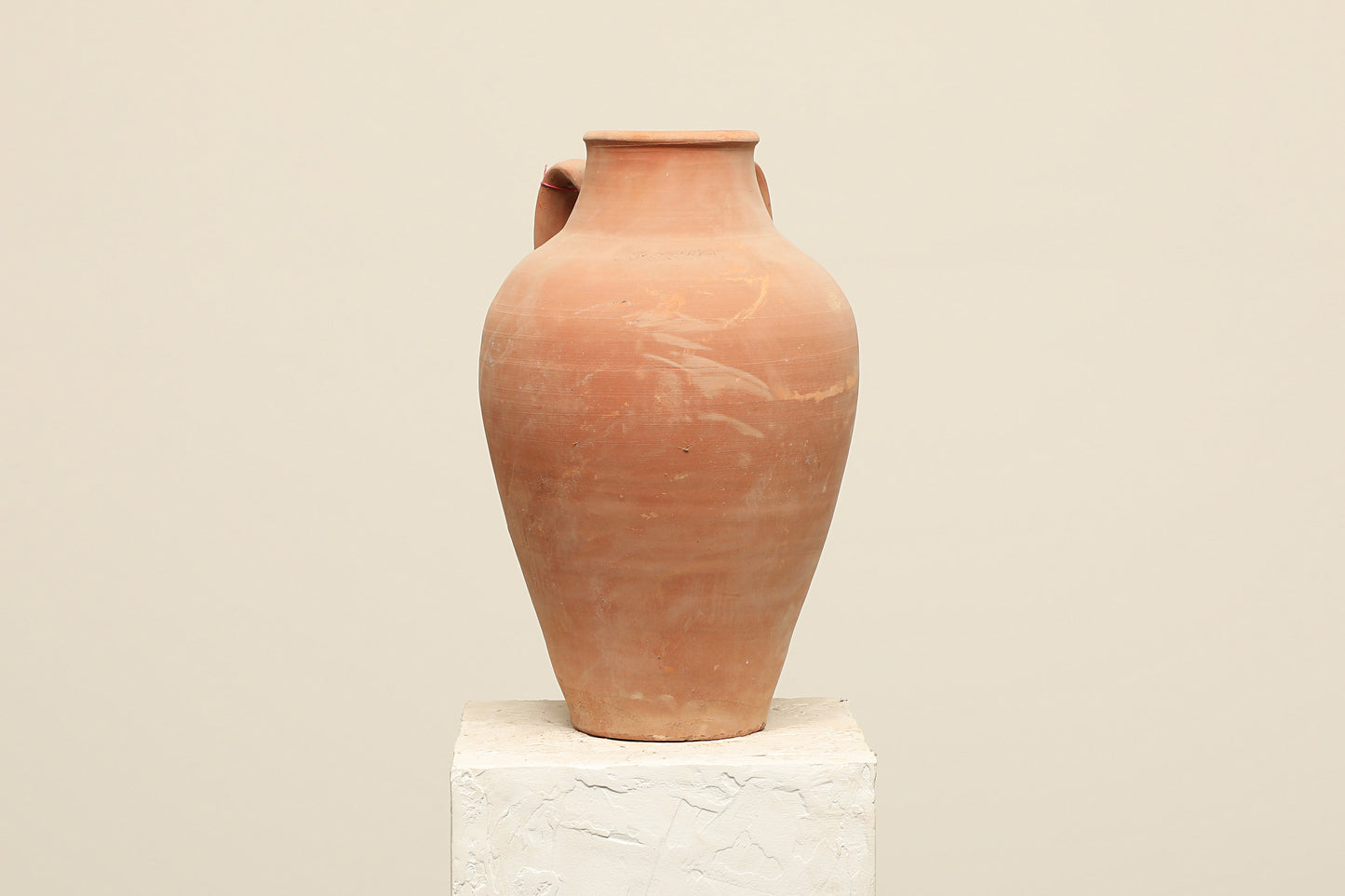 A one-of-a-kind clay brown Turkish vintage vase pot with two handles, crafted from terra cotta clay, this piece showcases timeless quality and antique craftsmanship, adding a unique touch of history to your space