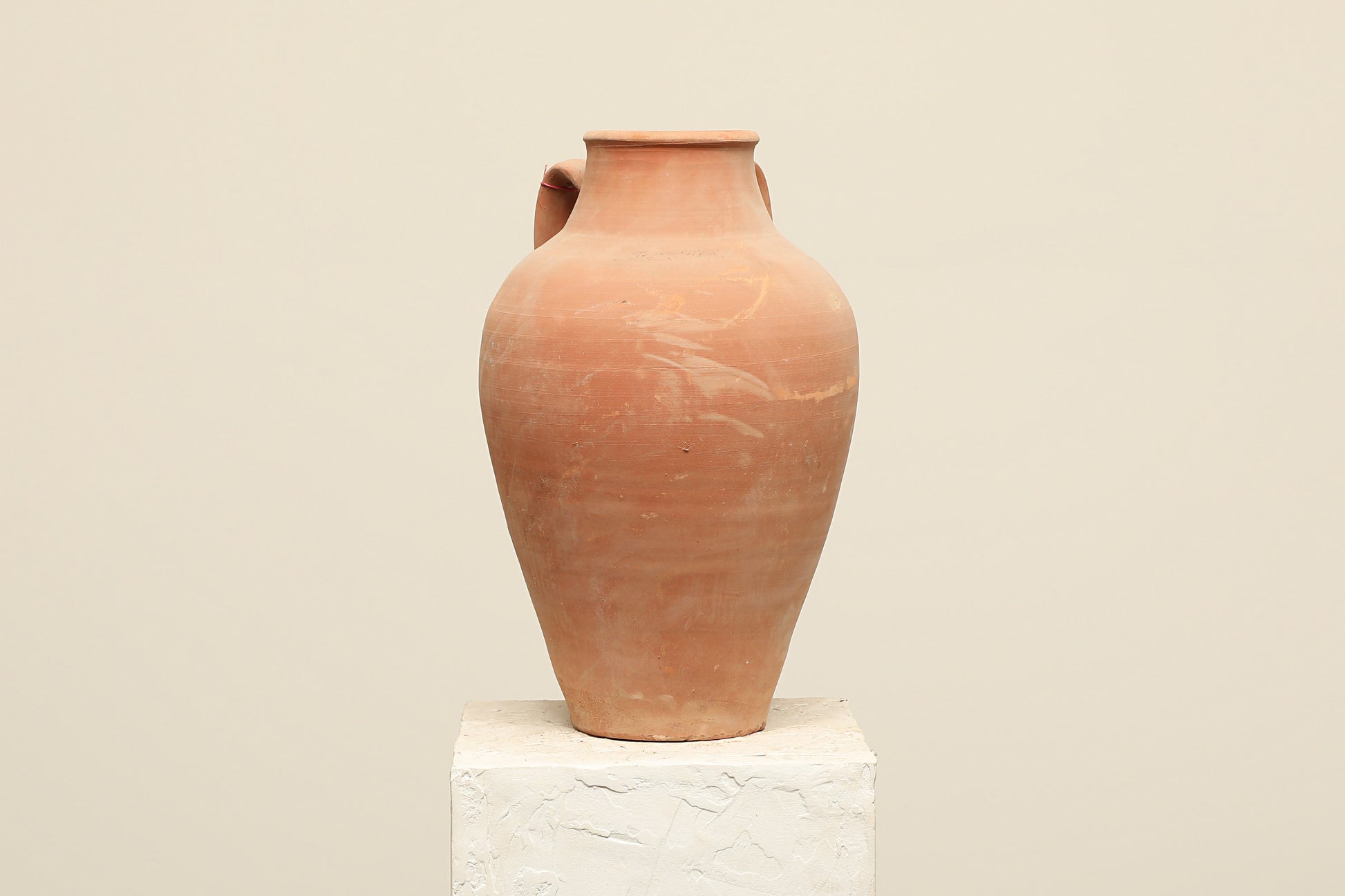 A one-of-a-kind clay brown Turkish vintage vase pot with two handles, crafted from terra cotta clay, this piece showcases timeless quality and antique craftsmanship, adding a unique touch of history to your space