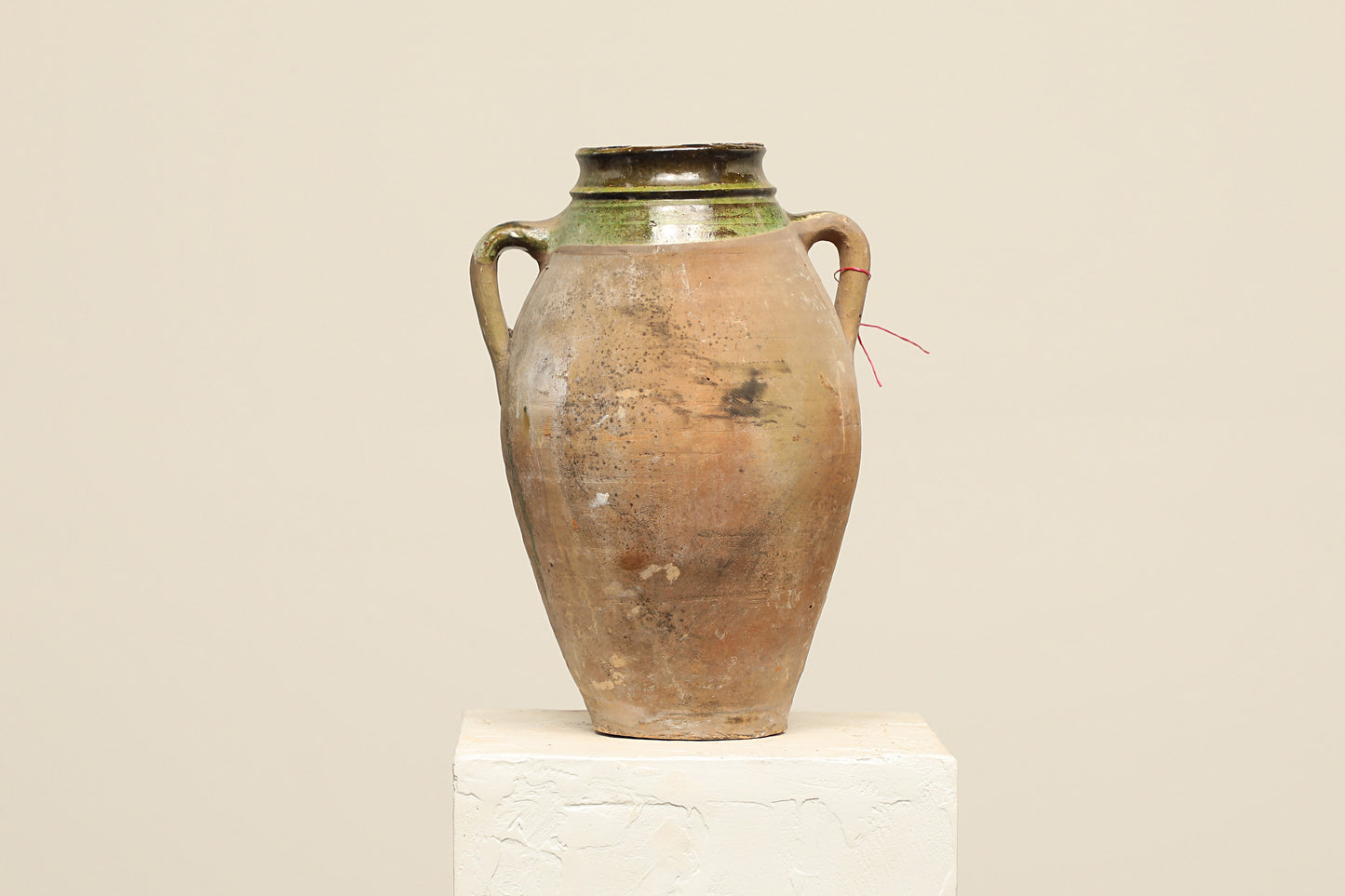 A one-of-a-kind clay brown Turkish vintage vase pot with two handles, crafted from terra cotta clay, this piece showcases timeless quality and antique craftsmanship, adding a unique touch of history to your space