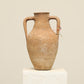 A one-of-a-kind clay brown Turkish vintage vase pot with two handles, crafted from terra cotta clay, this piece showcases timeless quality and antique craftsmanship, adding a unique touch of history to your space
