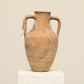 A one-of-a-kind clay brown Turkish vintage vase pot with two handles, crafted from terra cotta clay, this piece showcases timeless quality and antique craftsmanship, adding a unique touch of history to your space