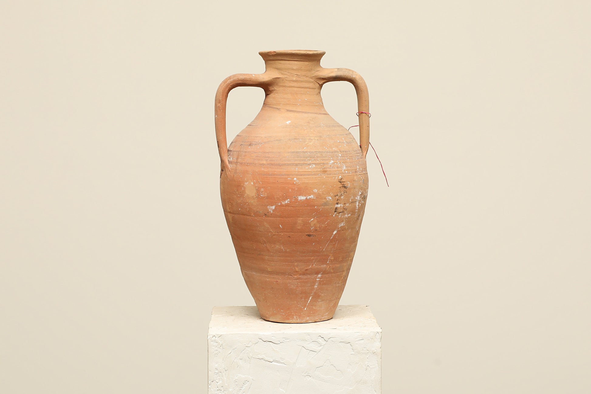 A one-of-a-kind clay brown Turkish vintage vase pot with two handles, crafted from terra cotta clay, this piece showcases timeless quality and antique craftsmanship, adding a unique touch of history to your space