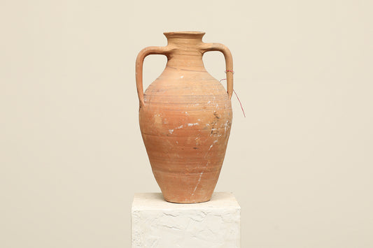 A one-of-a-kind clay brown Turkish vintage vase pot with two handles, crafted from terra cotta clay, this piece showcases timeless quality and antique craftsmanship, adding a unique touch of history to your space