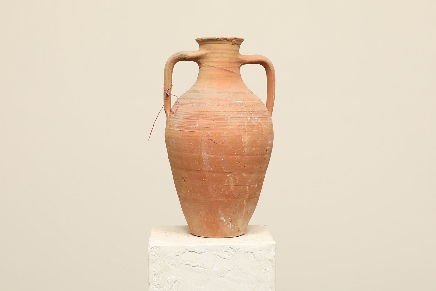 A one-of-a-kind clay brown Turkish vintage vase pot with two handles, crafted from terra cotta clay, this piece showcases timeless quality and antique craftsmanship, adding a unique touch of history to your space