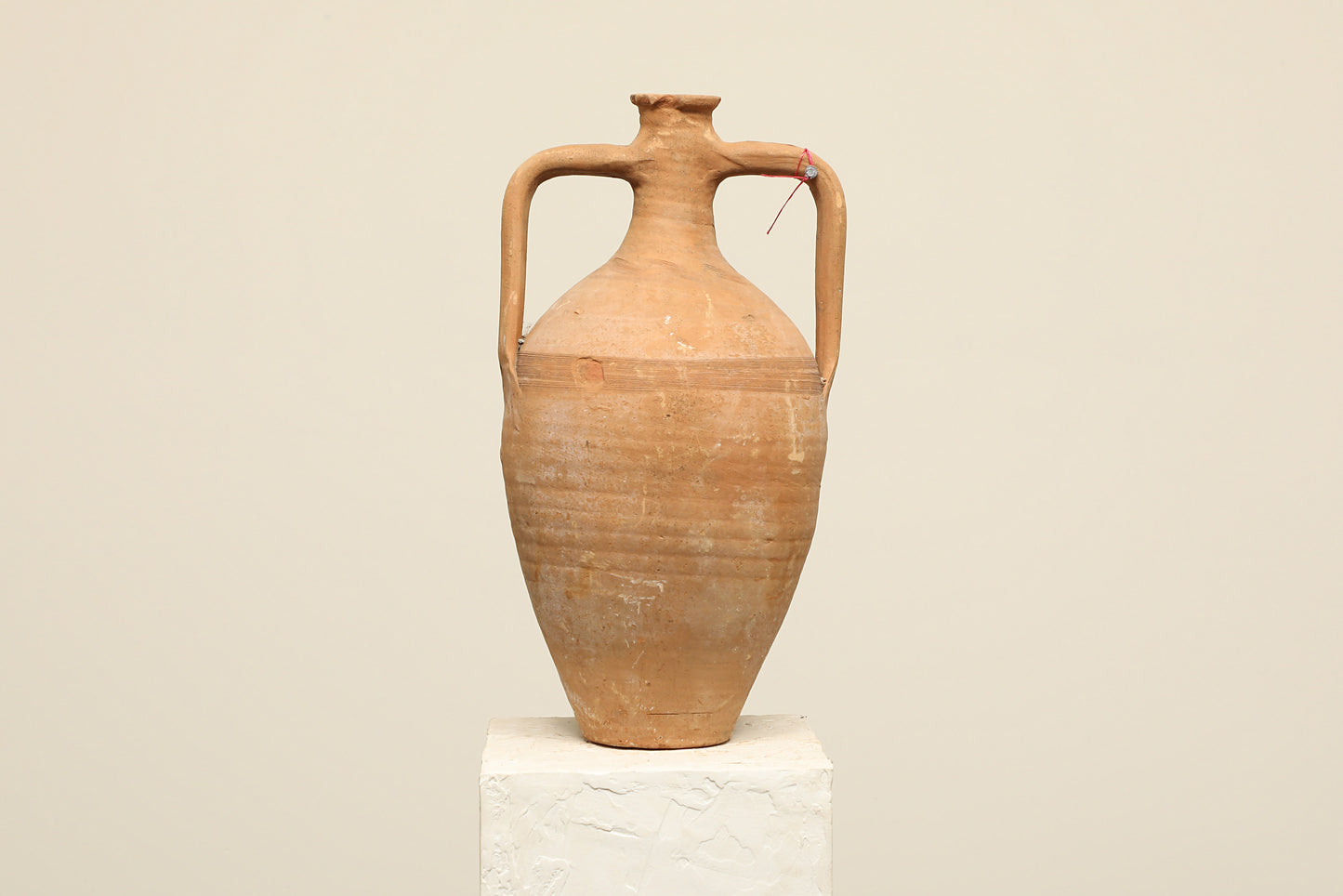 A one-of-a-kind clay brown Turkish vintage vase pot with two handles, crafted from terra cotta clay, this piece showcases timeless quality and antique craftsmanship, adding a unique touch of history to your space