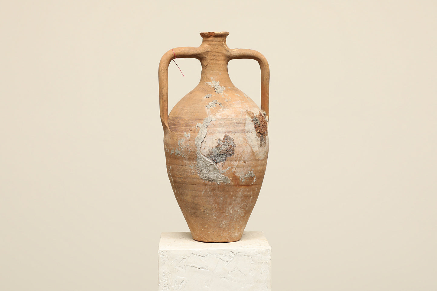 A one-of-a-kind clay brown Turkish vintage vase pot with two handles, crafted from terra cotta clay, this piece showcases timeless quality and antique craftsmanship, adding a unique touch of history to your space