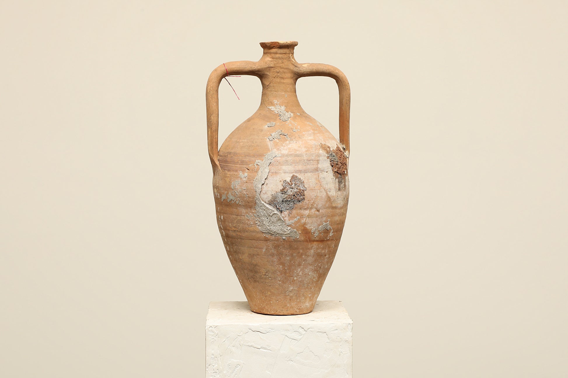 A one-of-a-kind clay brown Turkish vintage vase pot with two handles, crafted from terra cotta clay, this piece showcases timeless quality and antique craftsmanship, adding a unique touch of history to your space