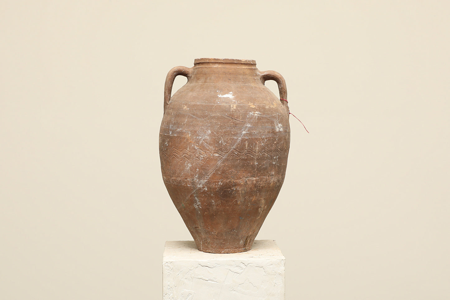 A one-of-a-kind clay brown Turkish vintage vase pot with two handles, crafted from terra cotta clay, this piece showcases timeless quality and antique craftsmanship, adding a unique touch of history to your space