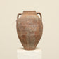 A one-of-a-kind clay brown Turkish vintage vase pot with two handles, crafted from terra cotta clay, this piece showcases timeless quality and antique craftsmanship, adding a unique touch of history to your space