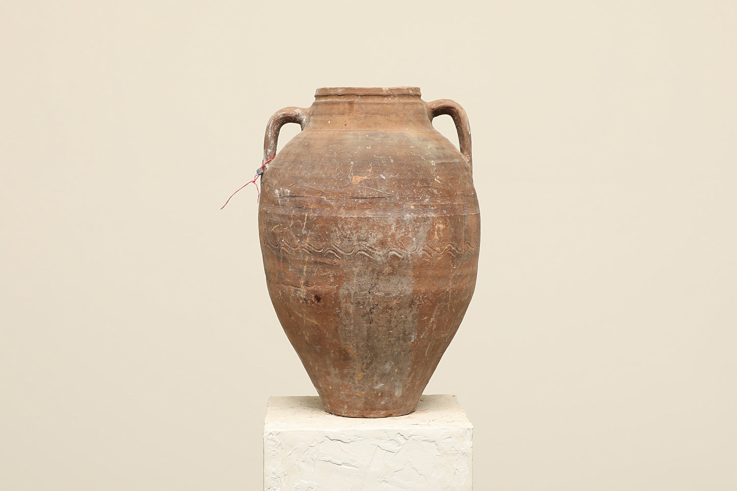 A one-of-a-kind clay brown Turkish vintage vase pot with two handles, crafted from terra cotta clay, this piece showcases timeless quality and antique craftsmanship, adding a unique touch of history to your space