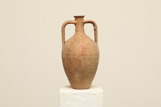 A one-of-a-kind clay brown Turkish vintage vase pot with two handles, crafted from terra cotta clay, this piece showcases timeless quality and antique craftsmanship, adding a unique touch of history to your space