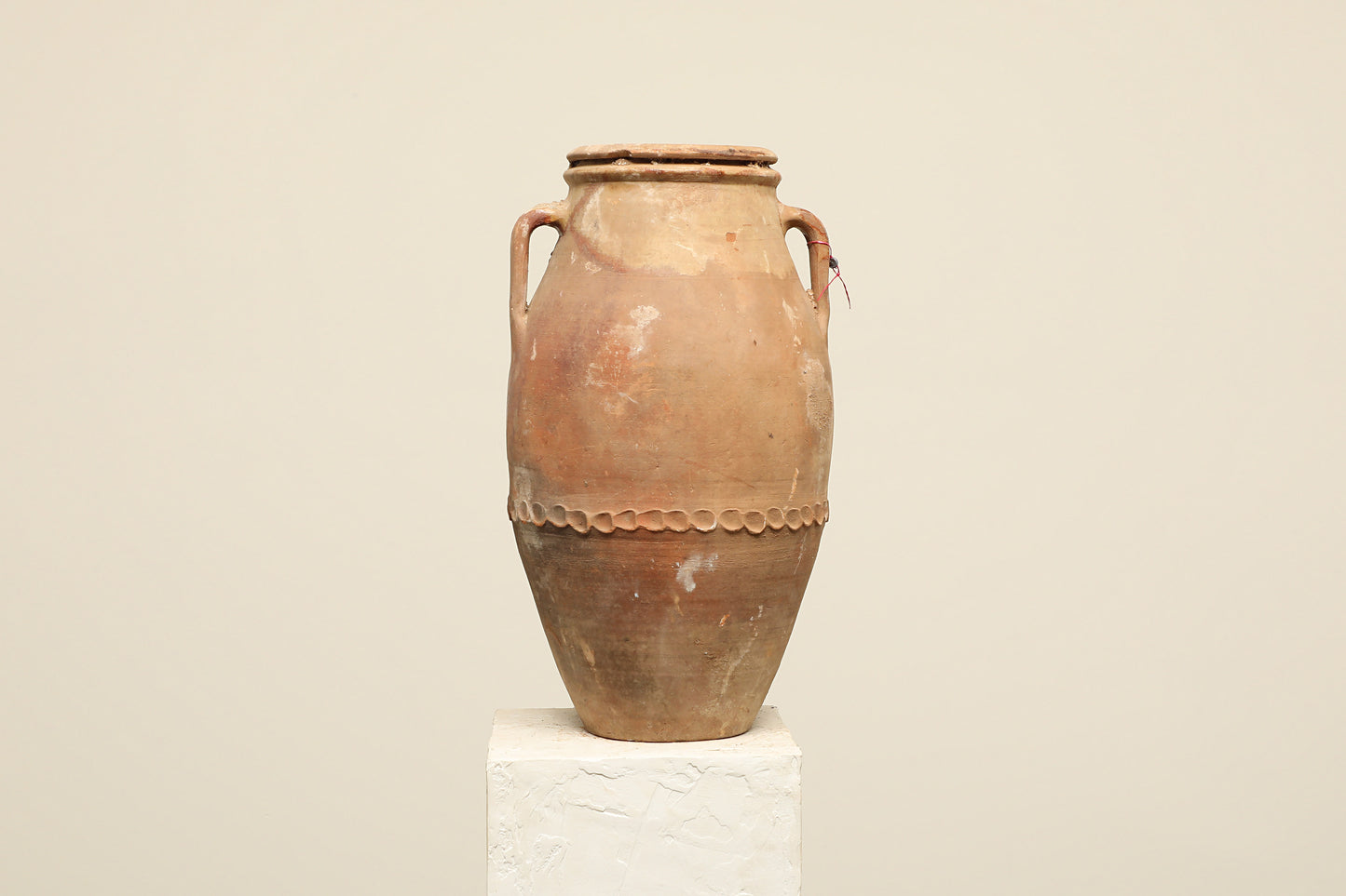 A one-of-a-kind clay brown Turkish vintage vase pot with two handles, crafted from terra cotta clay, this piece showcases timeless quality and antique craftsmanship, adding a unique touch of history to your space