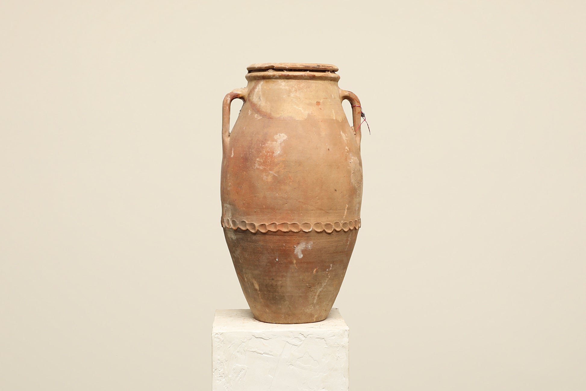 A one-of-a-kind clay brown Turkish vintage vase pot with two handles, crafted from terra cotta clay, this piece showcases timeless quality and antique craftsmanship, adding a unique touch of history to your space