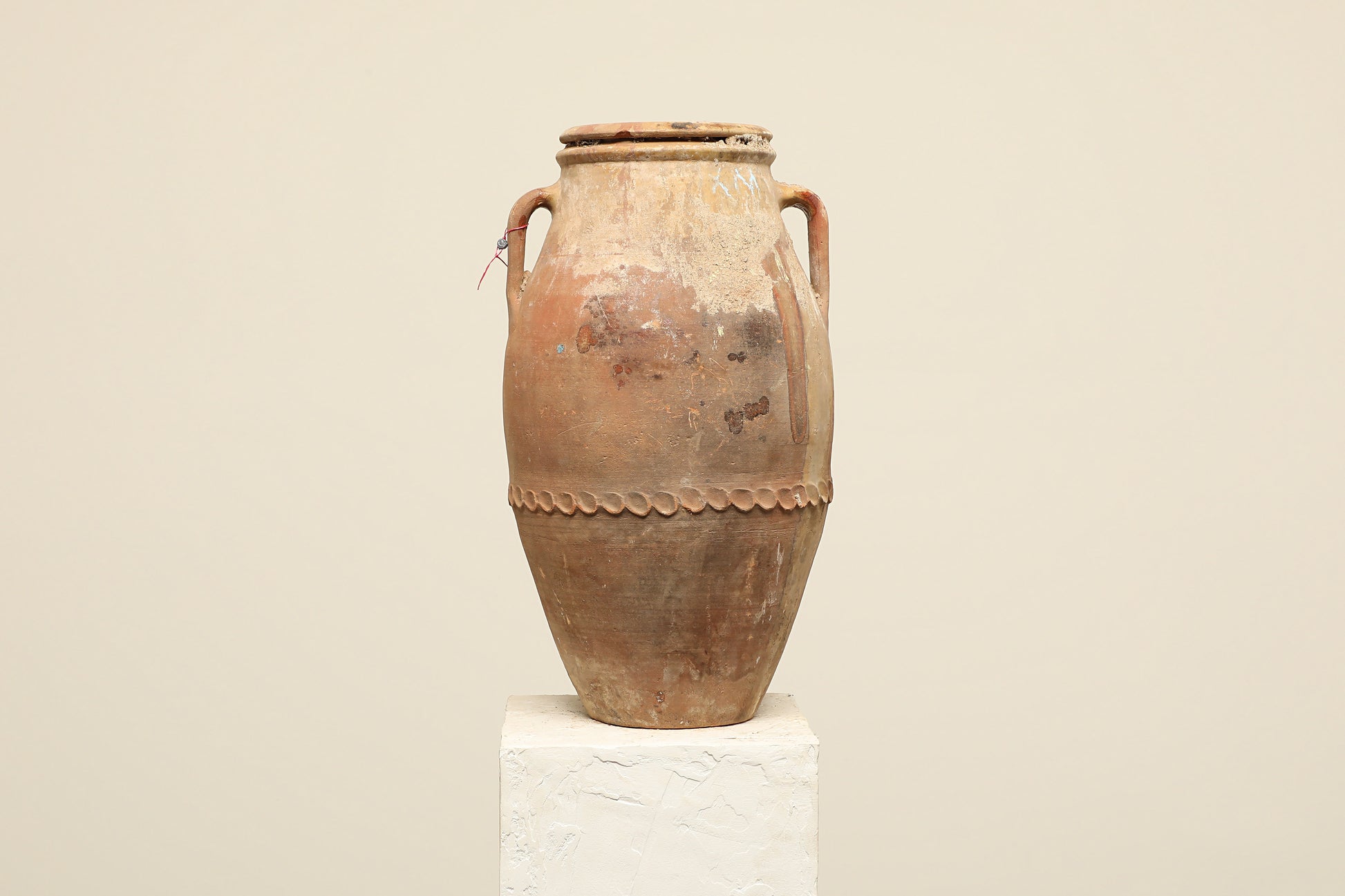 A one-of-a-kind clay brown Turkish vintage vase pot with two handles, crafted from terra cotta clay, this piece showcases timeless quality and antique craftsmanship, adding a unique touch of history to your space