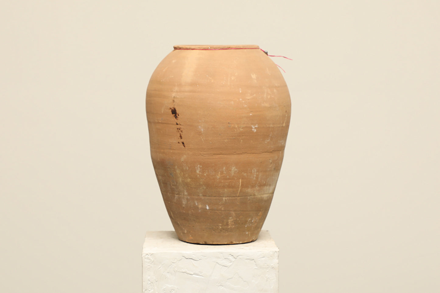 A one-of-a-kind clay brown Turkish vintage vase pot without a handle, crafted from terra cotta clay, this piece showcases timeless quality and antique craftsmanship, adding a unique touch of history to your space