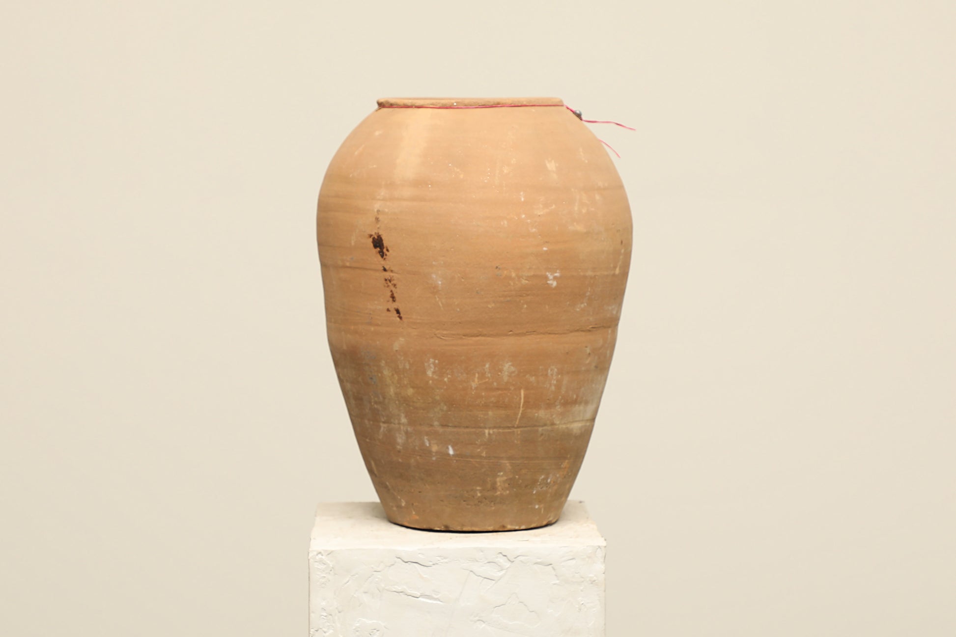 A one-of-a-kind clay brown Turkish vintage vase pot without a handle, crafted from terra cotta clay, this piece showcases timeless quality and antique craftsmanship, adding a unique touch of history to your space