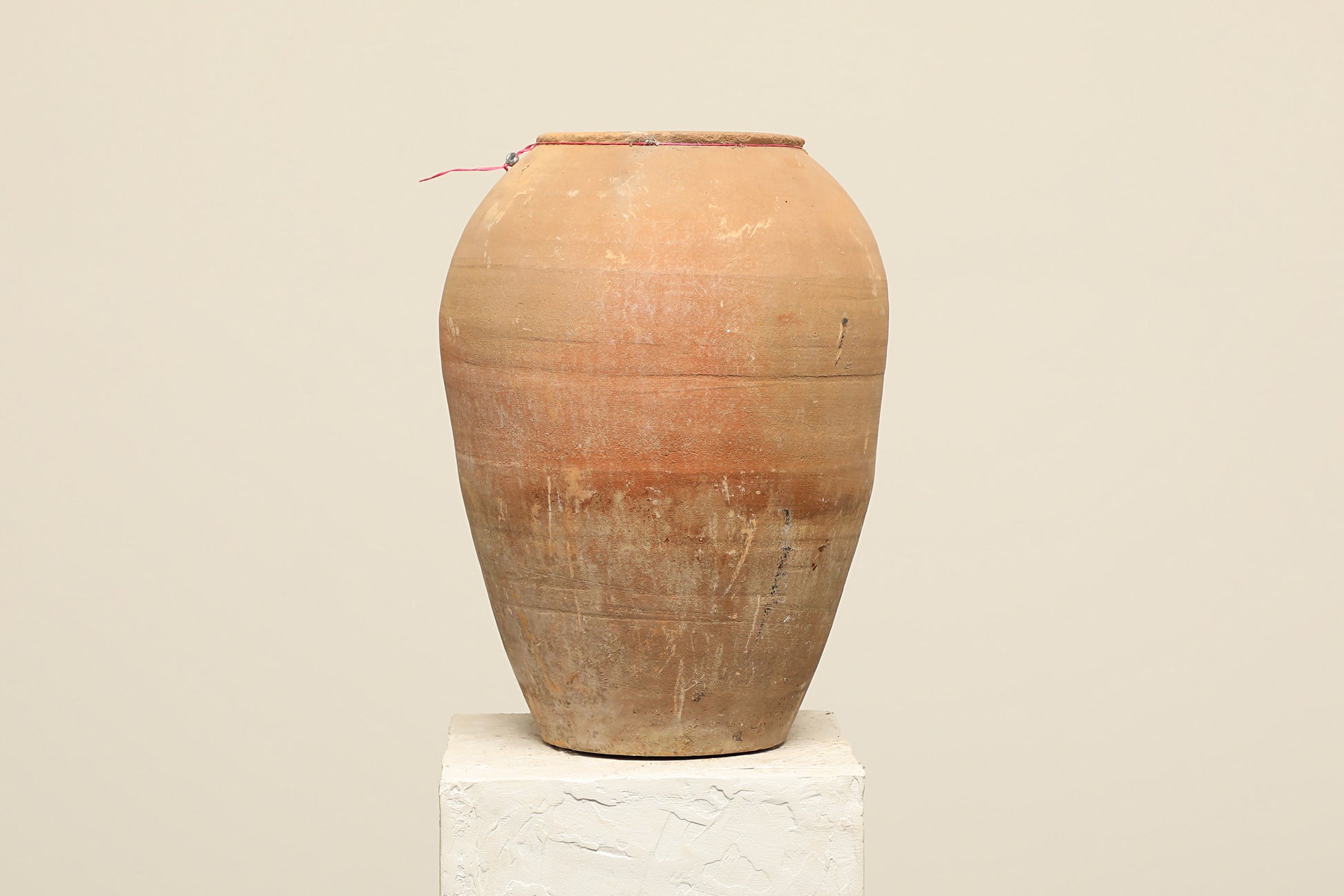 A one-of-a-kind clay brown Turkish vintage vase pot without a handle, crafted from terra cotta clay, this piece showcases timeless quality and antique craftsmanship, adding a unique touch of history to your space