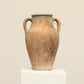A one-of-a-kind clay brown Turkish vintage vase pot with two handles, crafted from terra cotta clay, this piece showcases timeless quality and antique craftsmanship, adding a unique touch of history to your space